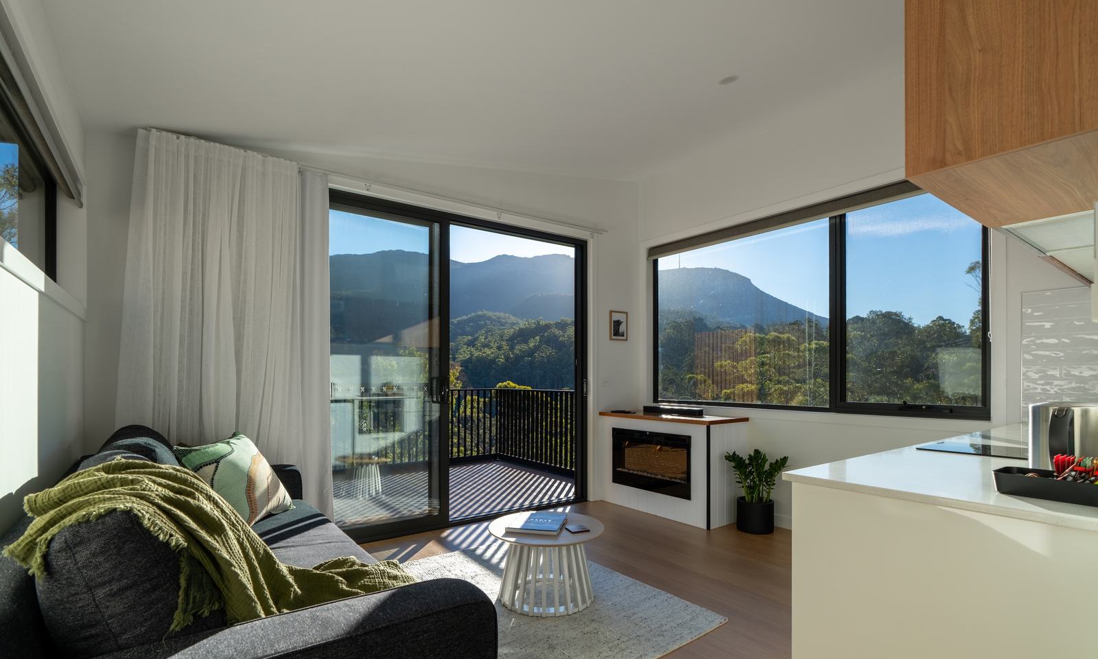 Mosswood living room looking out to mountain views