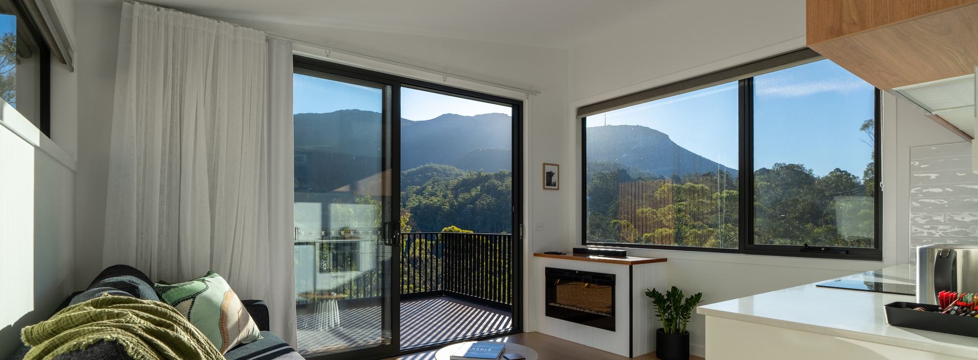 Mosswood living room looking out to mountain views
