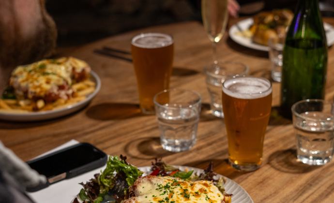 Pub dinner on table with drinks