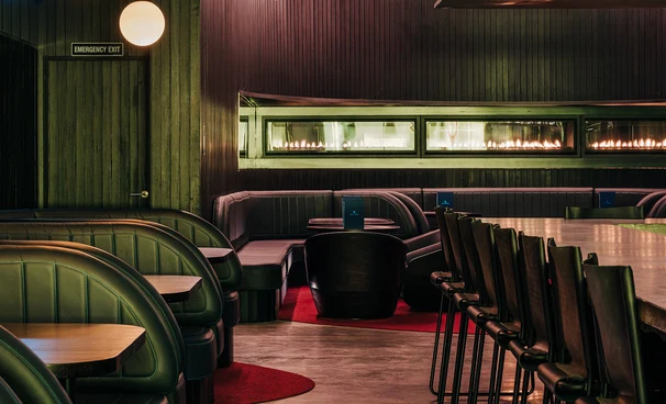 Moody Interior of green couches
