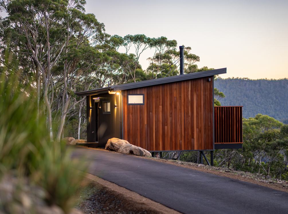 Timber-clad Breath cabin surrounded by native forest in Fern Tree.